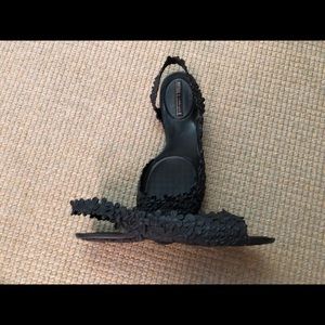 Fun flowered beach shoes. Melissa Campana